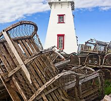 Lighthouse and Old Lobster Traps, North Rustico, PEI by Kenneth Keifer