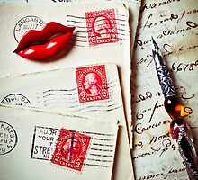 Red lips pin and old letters by Garry Gay