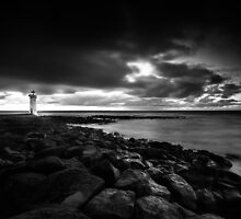 Port Fairy lighthouse moving low clouds sunrise by hangingpixels