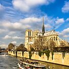 Boats on the Seine Passing Notre Dame by Mark Tisdale