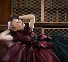 Victorian woman in library by Nando MacHado