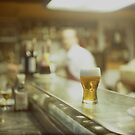 Glass of beer in Spanish tapas bar square Hasselblad medium format  c41 color film analogue photograph by edwardolive