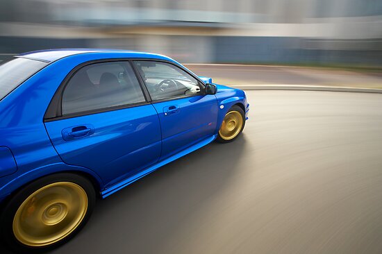 Blue Subaru Impreza WRX rig shot by John Jovic