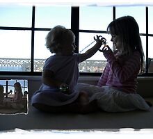 sibling silhouette 2-the receiving by sunset