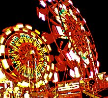 Two Ferris Wheels at Night by Bob Fox
