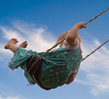 Little Girl on Swing by Michael Mill