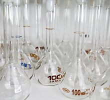 Belly test tubes standing in a chemistry lab by mrfotos