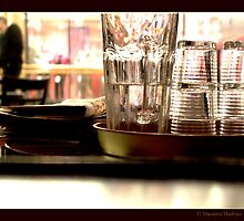 Drinks and Newspaper by Rowan Lewgalon