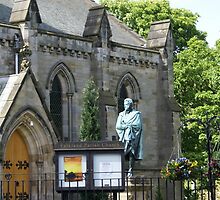 Falkland Parish Church and monument to former laird by BronReid