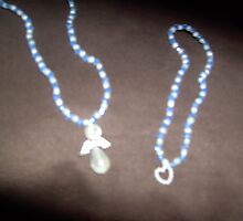 I'm loving angels instead - angel necklace and heart bracelet by anaisnais