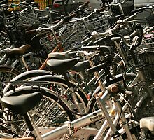 Bikes on the street, Tokyo, Japan by Brad Starks