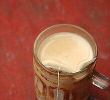 hot tea with milk by bayu harsa